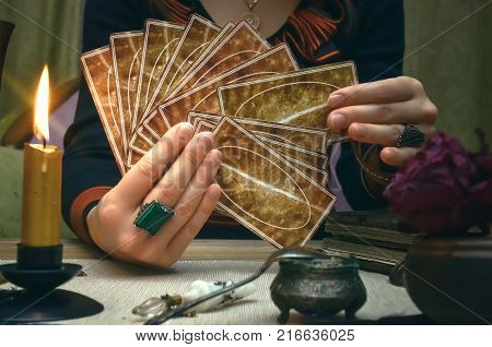 Tarot cards on fortune teller desk table. Future reading.