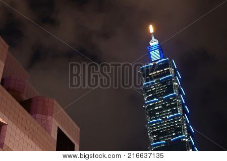 Taipei, Taiwan - November 10, 2017 : Motion of car driving through Taipei 101 at night