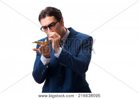 Businessman with magic lamp isolated on white