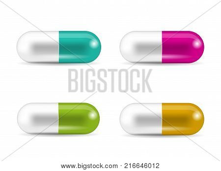 Set of capsule-shaped tablets. Collection of pills in caplet forms. Medicine and drugs.