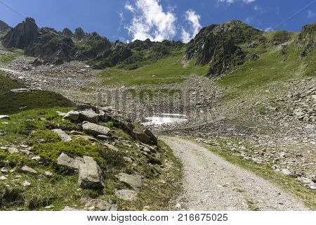 Summer view of mountain trail near the Le Brevent in the French Alps.
