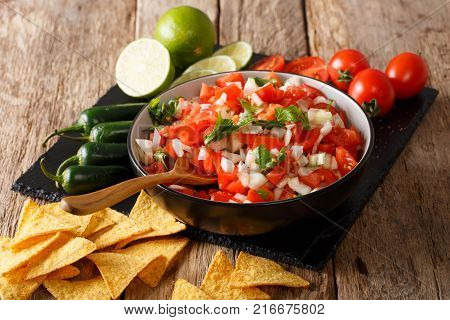 Pieces Of Chicken Stew With Potatoes, Peppers, Tomatoes, Peas And Onions Close-up. Vertical Top View