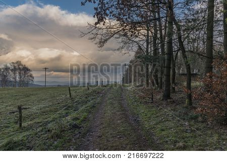 Path near Bynovec village in national park in autumn afternoon