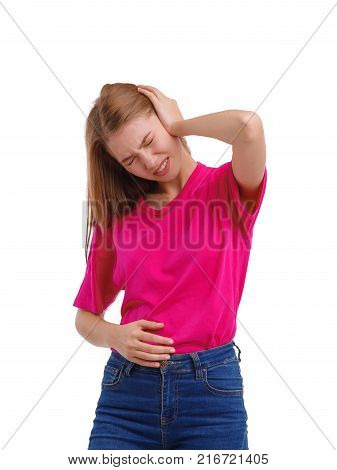 Portrait of a young girl in a pink t-shirt, the girl holds on to the belly, and behind the head, in the studio, a terrible pain, isolated on a white background.
