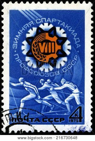 USSR - CIRCA 1975: A post stamp printed in the USSR shows running skier, devoted to the Winter Games of Soviet Trade Unions, series, circa 1975