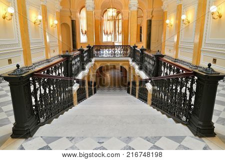 Looking Down A Marble Staircase In The Grand Gatchina Palace