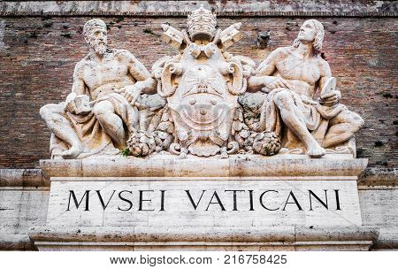 Rome, November 2017 Vatican City, Italy: Sculptures above an entrance to the Vatican Museum in Rome, The museums contain roughly 70, 000 works, of which 20, 000 are on display, There are 54 galleries, with the Sistine Chapel