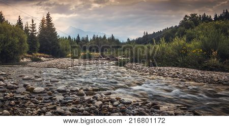 Bela River with Krivan Peak at Sunset in Slovakia