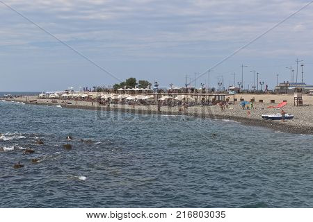 Adler, Krasnodar region, Russia - July 8, 2016: View from the pier on beach, 