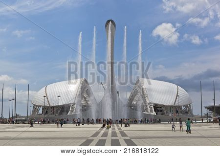 Adler, Krasnodar region, Russia - July 8, 2016: View of the singing fountain and the stadium 