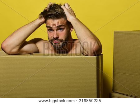 Caucasian Bearded Sexy Macho Man Holding Red Packages Or Bags