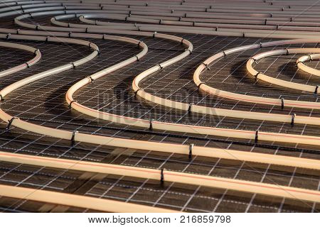 Construction of house. Tubing are elements of radiant floor heating system