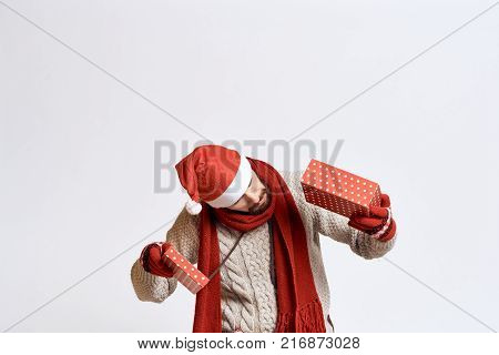 man looks at the bottom of the box, gift, new year.