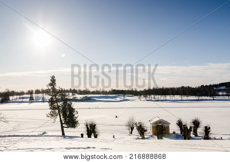 Frozen lake panoramic view of Bogstadvannet lake in Oslo Norway. Copying space