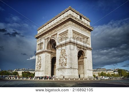 Arc de Triomphe against a blue sky 