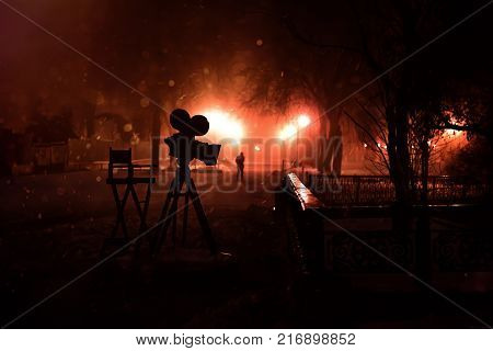 Silhouette camera in Night Park winter street cold