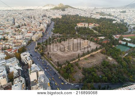 aerial view of Temple of Zeus at Olympia in Athens and modern part of the city, Greece