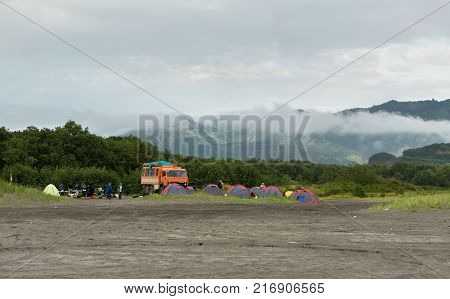 Kamchatka Peninsula, Russia - August 27, 2016: Campground of tourists on Zavoiko Bay in the Pacific Ocean on the outskirts of the city Petropavlovsk-Kamchatsky