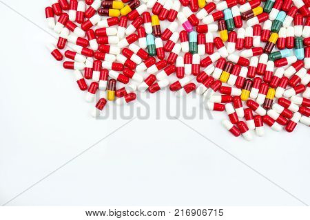 Colorful of antibiotic capsules pills isolated on white background with copy space. Drug resistance concept. Antibiotics drug use with reasonable and global healthcare concept.