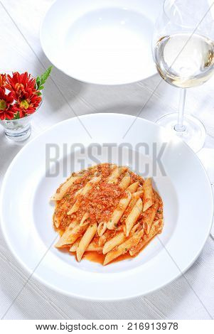 close up of Pasta with meat and white wine