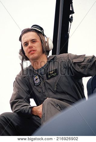 SAN DIEGO, CA. MARCH 30, 2012. CIRCA: Marine F16 fighter pilot sitting on his jet on the runway in San Diego, Ca.