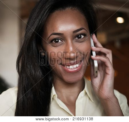 African American woman talking on a mobile phone - Black people