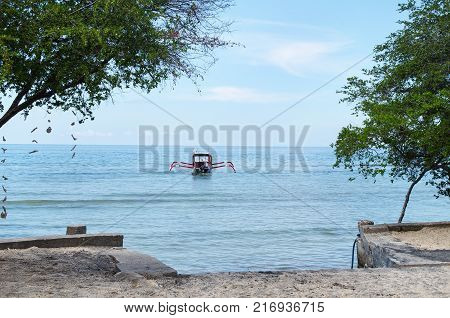 Traditional fishing boat trimaran in Bali, Indonesia. Stock image.