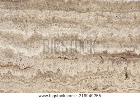 Background from natural travertine Travertino Classico macro.