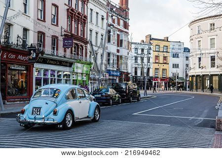 Cork, Ireland - November 12, 2017: St Patrick Street in Cork. It is the main shopping street in the city