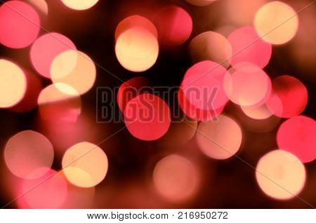 Bright christmas eve background. Plenty of golden sparkling bokeh from defocused garland lights. Backdrop for design