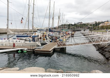 FUNCHAL PORTUGAL - SEPTEMBER 8 2016: Yachts moored in Funchal seaport Madeira island Portugal