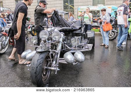 St. Petersburg, Russia - 5 August, People near the big tricycle, 5 August, 2017.
The annual Harley-Davidson Festival is held in the center of St. Petersburg.