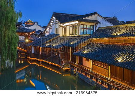 Wuzhen water village is Shanghai tourist attraction with more than 100000 visitors per year. Wuzhen is part of Tongxiang, northern Zhejiang Province, China.