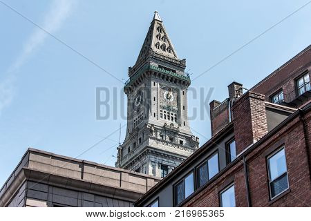 View of the historic Custom House skyscraper clock tower in skyline of Boston, Massachusetts USA