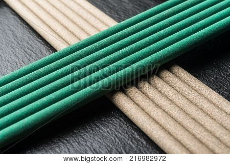 Electrodes for welding, on a black background