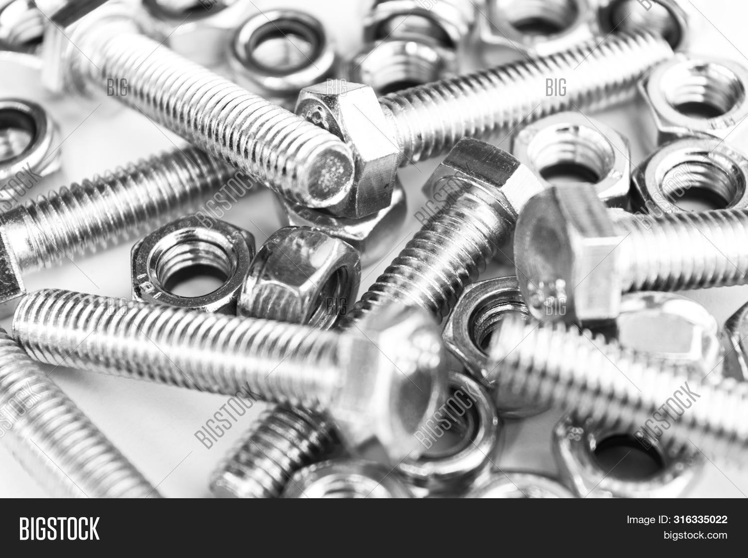 Metal Bolts Nuts Row Image & Photo (Free Trial) Bigstock