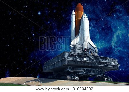 The Launch Pad Of The Spaceship, Against The Background Of The Beautiful Star Sky.  Elements Of This