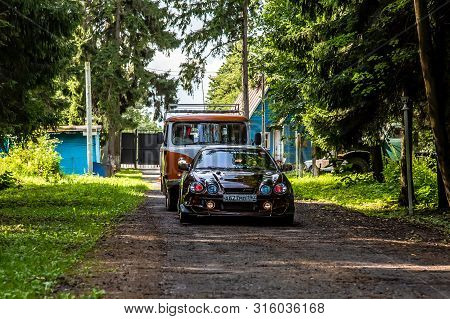 Moscow, Russia - July 13, 2019: Toyota Celica 202 Rides Along A Forest Road.