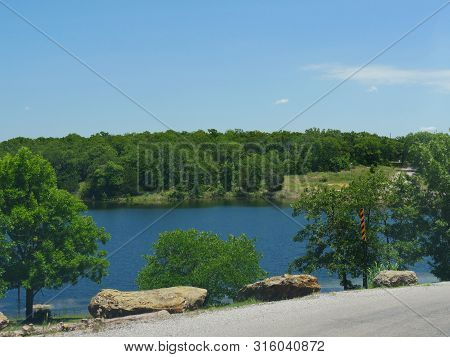 Blue Waters Of A Lake At The Chickasaw National Recreation Area In Davis, Oklahoma