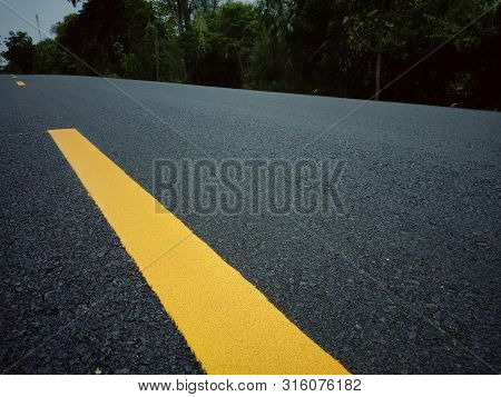 Road Traffic Paint On The Asphalt Surface And To Ensure Safety