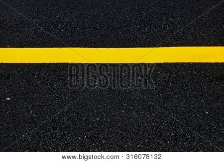 Road Traffic Paint On The Asphalt Surface And To Ensure Safety