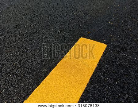 Road Traffic Paint On The Asphalt Surface And To Ensure Safety