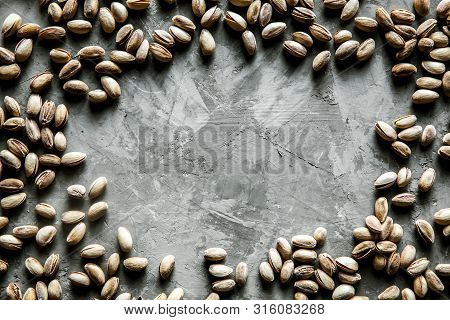 Big Set Of Salted Pistachios On The Table. Pistachios Nuts A