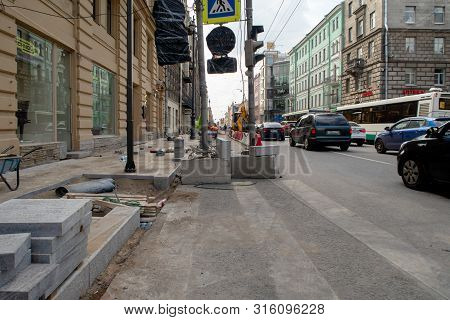 St. Petersburg, Russia - August 08, 2019: Repair Of Sidewalks On Bolshoi Prospect Of The Petrograd S