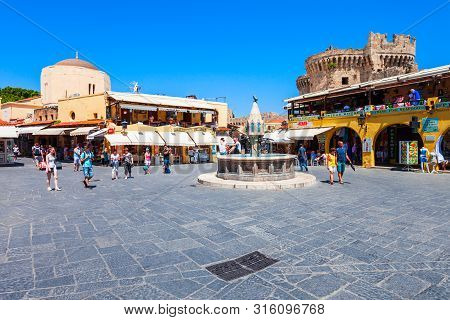 Rhodes, Greece - May 13, 2018: Hippocrates Fountain At The Rhodes Old Town Main Square In Rhodes Isl