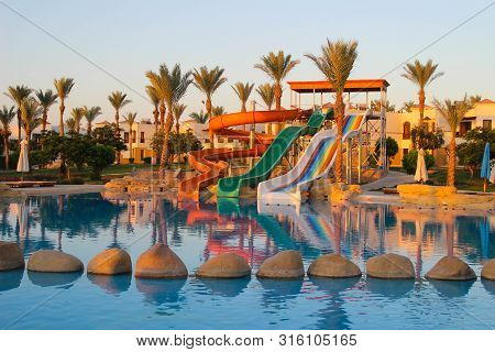 Sharm-el-sheikh/egypt - 06/21/2019. Water Colorful Rainbow Slides With Swimming Pool In The Hotel At