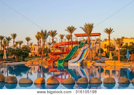 Sharm-el-sheikh/egypt - 06/21/2019. Water Colorful Rainbow Slides With Swimming Pool In The Hotel At
