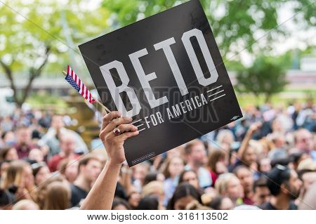 Houston, Texas - March 30, 2019: Supporter Holds Banner Beto For America During Beto Orourke Campaig
