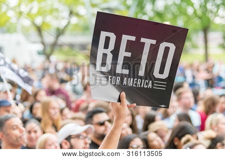 Houston, Texas - March 30, 2019: Supporter Holds Banner Beto For America During Beto Orourke Campaig