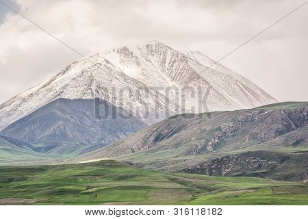 Mount Kose In Turkey Near Agri With Snow And Green Meadows